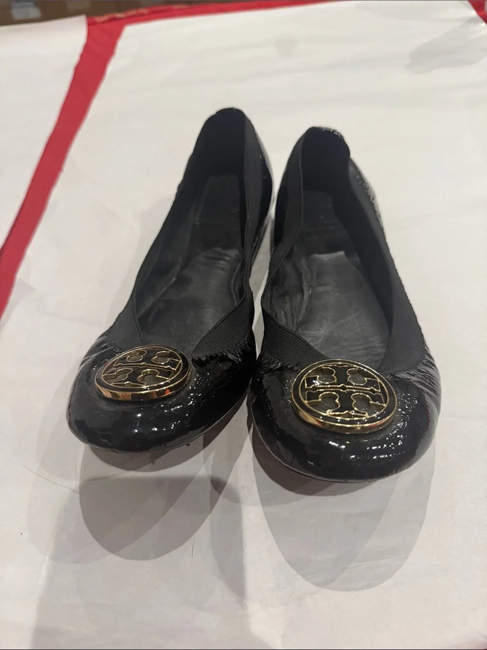 Tory Burch Black Patent Logo Ballet Flats with Gold Emblem